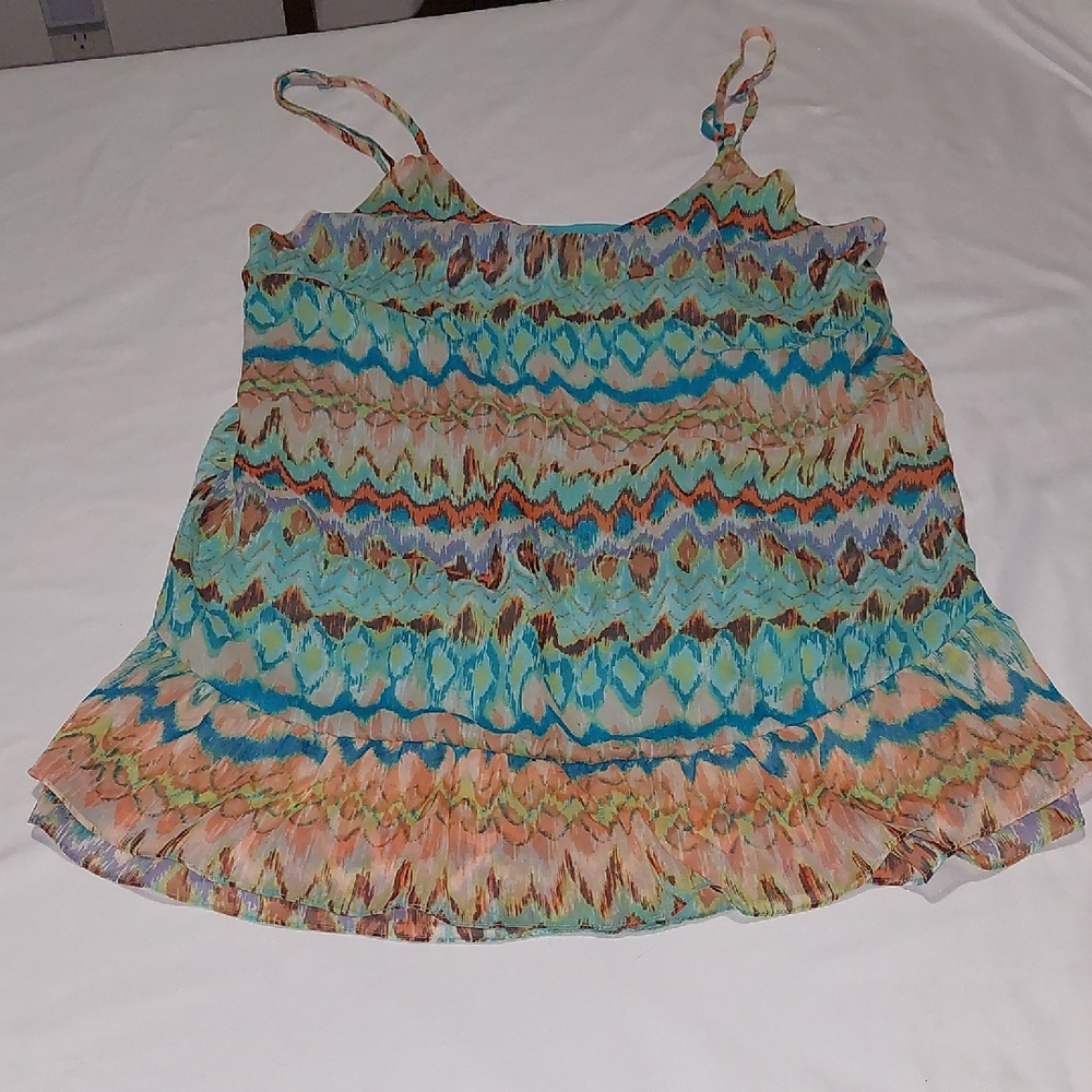 Multi Colored Tank Top.Spaghetti Strap Sleeves.Size Large .Ruffle At The Bottom.